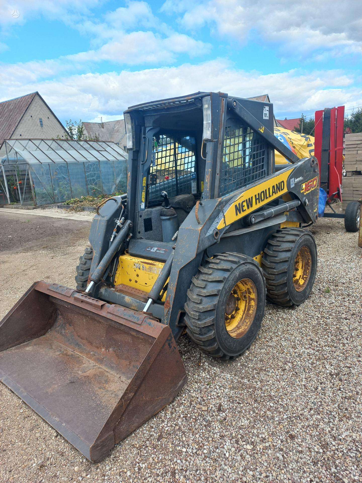New Holland L160 mini krautuvas
